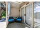 Outdoor patio with seating, sliding glass doors, and a tranquil view at 4297 Earney Rd, Woodstock, GA 30188
