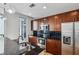 Modern kitchen with stainless steel appliances and dark wood cabinets at 44 Peachtree Nw Pl # 1828, Atlanta, GA 30309