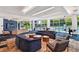 Community Lobby with comfortable seating, pool view, and modern decor at 44 Peachtree Nw Pl # 1828, Atlanta, GA 30309