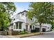 Modern white three-story home with attached garage and landscaped yard at 520 Wabash Ne Ave # B, Atlanta, GA 30312