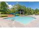 Relax by the community pool with a water slide and tower in a beautifully landscaped setting at 115 Greenbrier Way, Canton, GA 30114