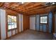 Unfinished basement with potential for expansion and ample natural light at 1357 Ridgewood Dr, Lilburn, GA 30047