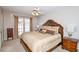 Spacious Primary bedroom with king-size bed and private access to backyard at 1357 Ridgewood Dr, Lilburn, GA 30047