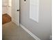 Clean and simple hallway with tile flooring at 1357 Ridgewood Dr, Lilburn, GA 30047