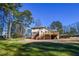House back view, showing the deck and backyard at 1357 Ridgewood Dr, Lilburn, GA 30047