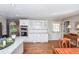 Bright eat-in kitchen with granite countertops and stainless steel appliances at 1357 Ridgewood Dr, Lilburn, GA 30047