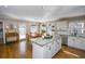 Spacious kitchen with granite countertops, white cabinets, and stainless steel appliances at 1357 Ridgewood Dr, Lilburn, GA 30047