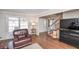 Relaxing living room with hardwood floors and leather recliners at 1357 Ridgewood Dr, Lilburn, GA 30047