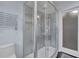 Bathroom with a modern glass shower enclosure and heated towel rack at 3457 Winter Wood Cv, Marietta, GA 30062