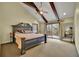 Bedroom featuring a king bed, ceiling fan, natural light, and access to the back deck at 3457 Winter Wood Cv, Marietta, GA 30062