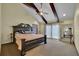 Bedroom with neutral carpet, a ceiling fan, a king bed, and lots of natural light at 3457 Winter Wood Cv, Marietta, GA 30062