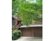 Charming home with lush landscaping, a curved driveway, and 2-car garage at 3457 Winter Wood Cv, Marietta, GA 30062