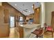Open kitchen with granite countertops, wooden cabinets, an island, and stainless steel appliances at 3457 Winter Wood Cv, Marietta, GA 30062