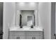 Modern bathroom with dual sinks, elegant countertops, and sleek fixtures at 8971 Callaway Dr, Winston, GA 30187