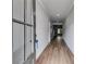 Inviting hallway with hardwood floors that lead to the living area at 8971 Callaway Dr, Winston, GA 30187