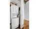 Efficient laundry area featuring a stacked washer and dryer for space-saving convenience at 3180 Mathieson Ne Dr # 703, Atlanta, GA 30305