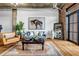 Bright and inviting living area featuring a neutral color palette and exposed ductwork at 3180 Mathieson Ne Dr # 703, Atlanta, GA 30305
