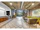Expansive lobby with tiled floors, comfortable seating areas, and views of the outdoor entrance at 3180 Mathieson Ne Dr # 703, Atlanta, GA 30305