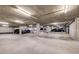 Spacious parking garage interior with ample parking spots and concrete construction at 3180 Mathieson Ne Dr # 703, Atlanta, GA 30305