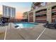 Resort-style swimming pool with lounge chairs and bar area at 3180 Mathieson Ne Dr # 703, Atlanta, GA 30305