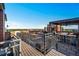 Spacious rooftop deck with comfortable seating, dining area, and great city views for entertaining and relaxation at 3180 Mathieson Ne Dr # 703, Atlanta, GA 30305