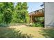 Backyard with deck, grass, and privacy fence at 520 Andes Ln, Canton, GA 30114