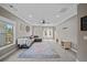Spacious bonus room with L-shaped sectional sofa and large windows at 520 Andes Ln, Canton, GA 30114