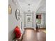 Bright entryway with hardwood floors and a bench at 520 Andes Ln, Canton, GA 30114