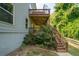 Two-tiered deck and stairs leading to the backyard at 520 Andes Ln, Canton, GA 30114