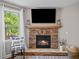 Stone fireplace creates a warm and inviting atmosphere at 520 Andes Ln, Canton, GA 30114