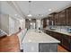 Modern kitchen with granite island and stainless steel appliances at 520 Andes Ln, Canton, GA 30114