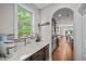 Kitchen features granite countertops and modern cabinetry at 520 Andes Ln, Canton, GA 30114
