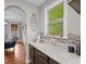Kitchen boasts granite countertops and stylish cabinetry at 520 Andes Ln, Canton, GA 30114