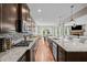 Open concept kitchen with granite island and stainless steel appliances at 520 Andes Ln, Canton, GA 30114