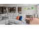 Open concept living space with hardwood floors and kitchen views at 520 Andes Ln, Canton, GA 30114