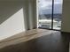 Bright bedroom with hardwood floors and large windows at 788 W Marietta Nw St # 805, Atlanta, GA 30318