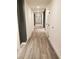 Long hallway with wood-look flooring at 788 W Marietta Nw St # 805, Atlanta, GA 30318
