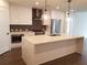 Modern kitchen with white cabinets and island at 788 W Marietta Nw St # 805, Atlanta, GA 30318