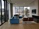 Elegant lounge with comfortable seating, fireplace, and large windows at 788 W Marietta Nw St # 805, Atlanta, GA 30318