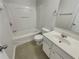 Bathroom with a tub, toilet, and vanity with a white countertop at 720 Crestwell Sw Cir, Atlanta, GA 30331