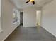 Spacious bedroom with grey carpet, a window, and en-suite bathroom at 720 Crestwell Sw Cir, Atlanta, GA 30331
