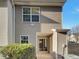 Rear exterior view showing sliding glass door and patio at 720 Crestwell Sw Cir, Atlanta, GA 30331