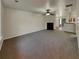 Spacious living room featuring a fireplace and neutral carpeting at 720 Crestwell Sw Cir, Atlanta, GA 30331