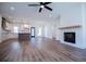 Open living space with kitchen, fireplace and hardwood floors at 16 Edgewater Dr, Temple, GA 30179