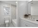 Clean bathroom with a bathtub, toilet and sink at 436 Valley Brook Ne Dr, Atlanta, GA 30342