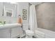 Elegant bathroom with gray tile and white fixtures at 2060 Westwood Ave, Atlanta, GA 30310