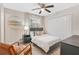 Cozy bedroom with double doors and light neutral decor at 2060 Westwood Ave, Atlanta, GA 30310