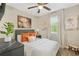 Spacious bedroom with orange pillows and a ceiling fan at 2060 Westwood Ave, Atlanta, GA 30310
