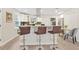 Kitchen island with seating for three and granite countertop at 2060 Westwood Ave, Atlanta, GA 30310