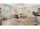 Open living space with hardwood floors, sectional sofa, and access to kitchen at 2060 Westwood Ave, Atlanta, GA 30310